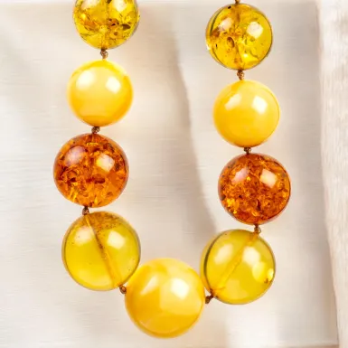 Collana di Ambra Baltica: Armonia di Sfumature e S...
