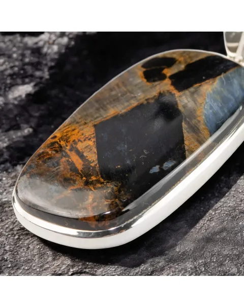 Gioiello Esclusivo con Pietersite: Magia di Colori.