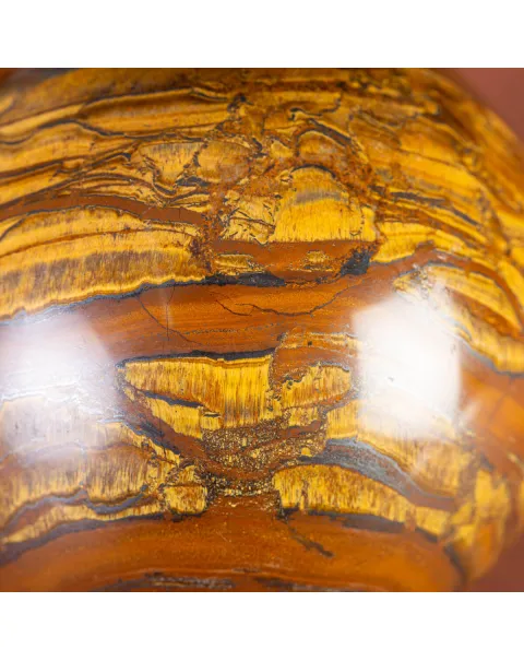 Sfera in Tiger Iron Intagliata.