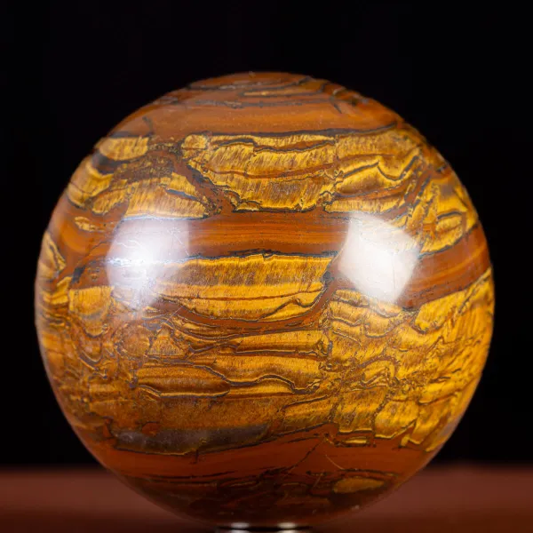 Sfera in Tiger Iron Intagliata.
