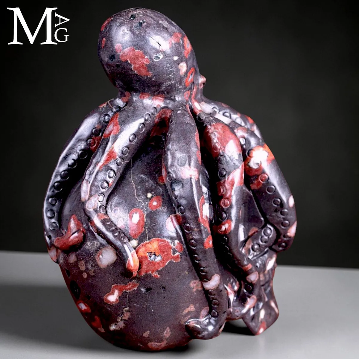 Scultura in Diaspro Nero – Teschio con Polpo.