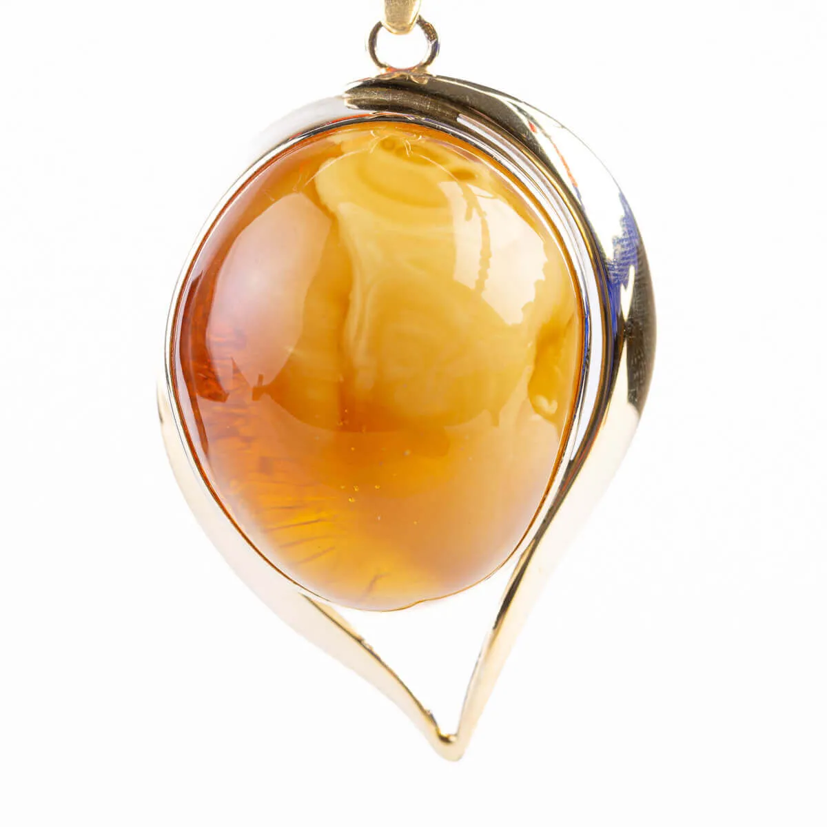 Esclusivo gioiello in argento con grande cabouchon di ambra baltica Butterscotch.
