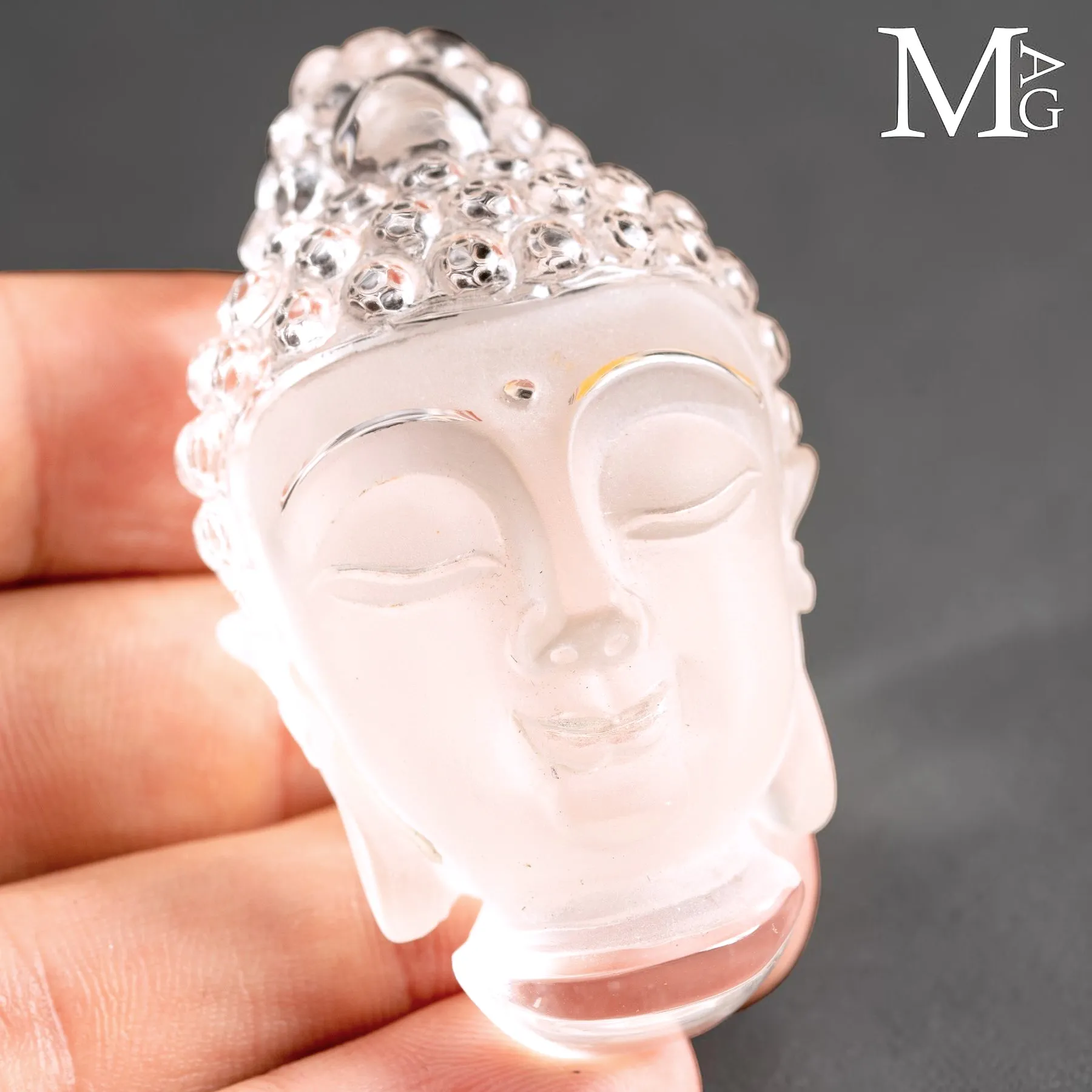 Testa di Buddha in Quarzo Extra Chiaro del Tibet.